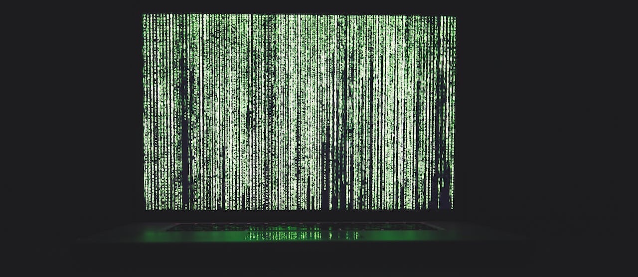 Computer screen with matrix-like code.